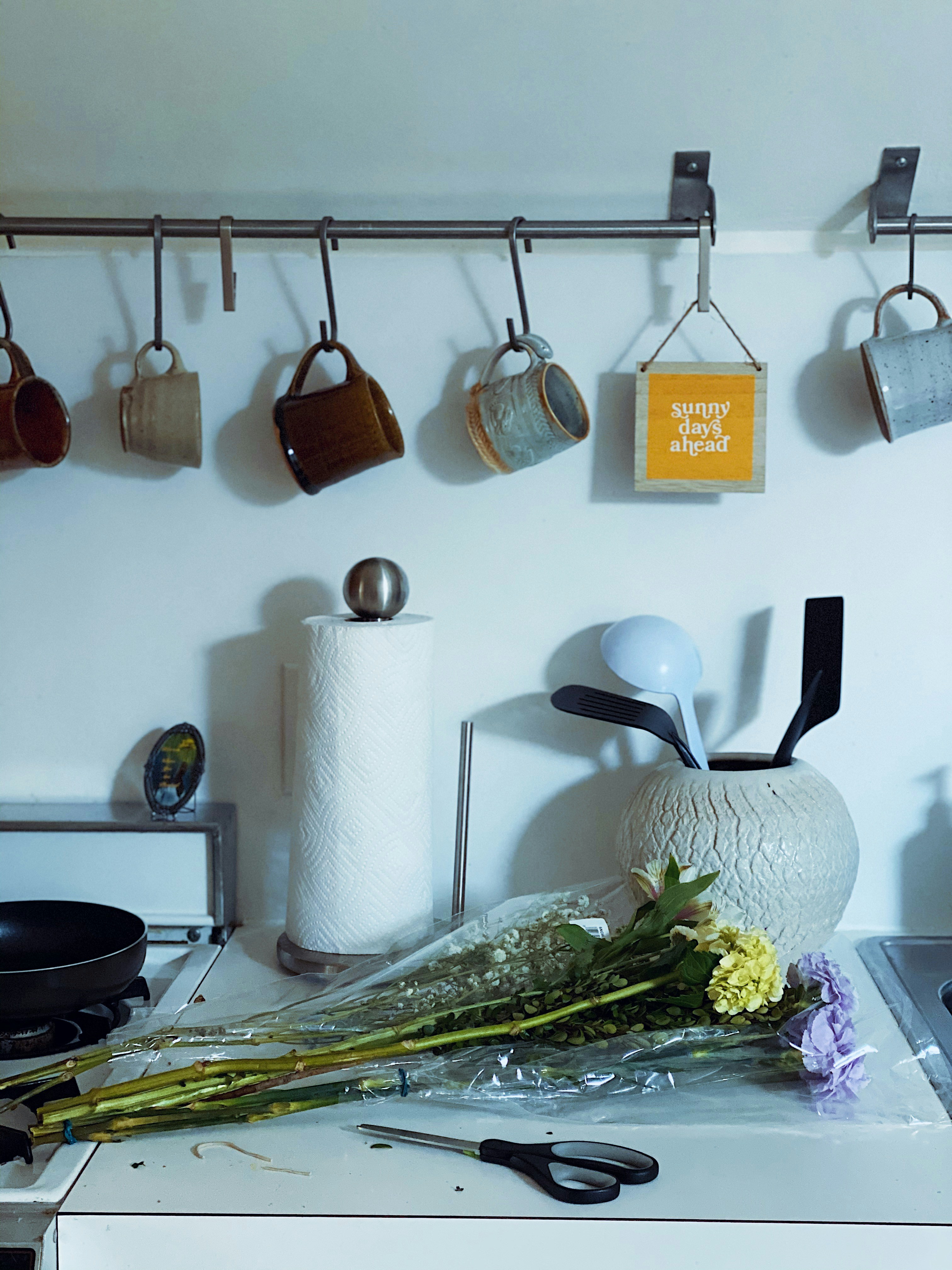 a kitchen with utensils and cooking utensils