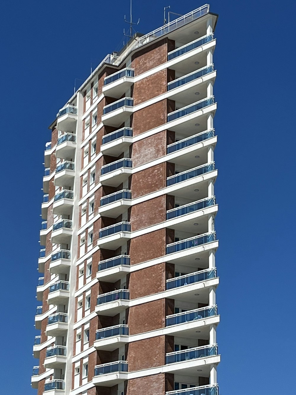 a tall building with balconies
