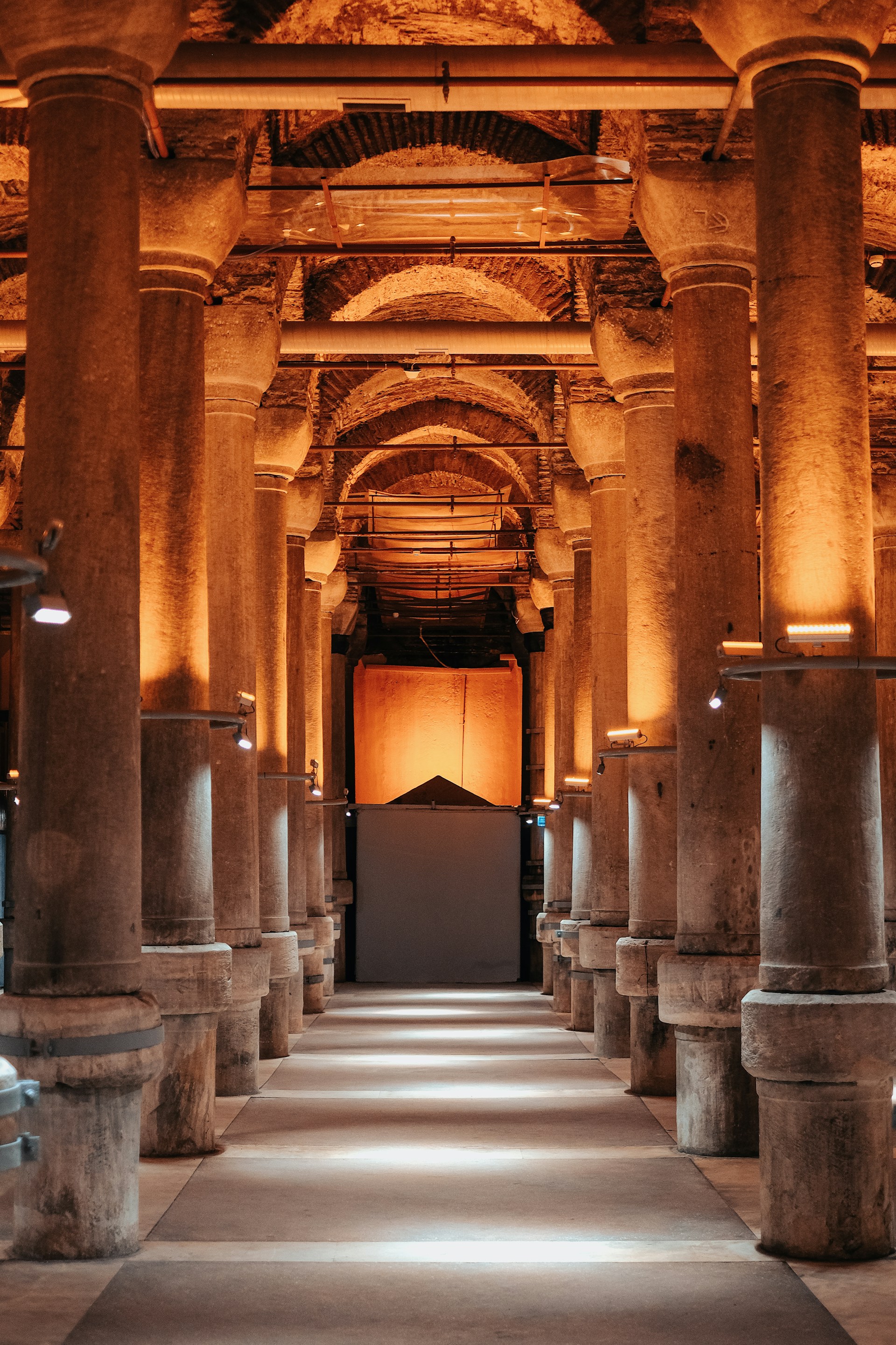 a hallway with pillars