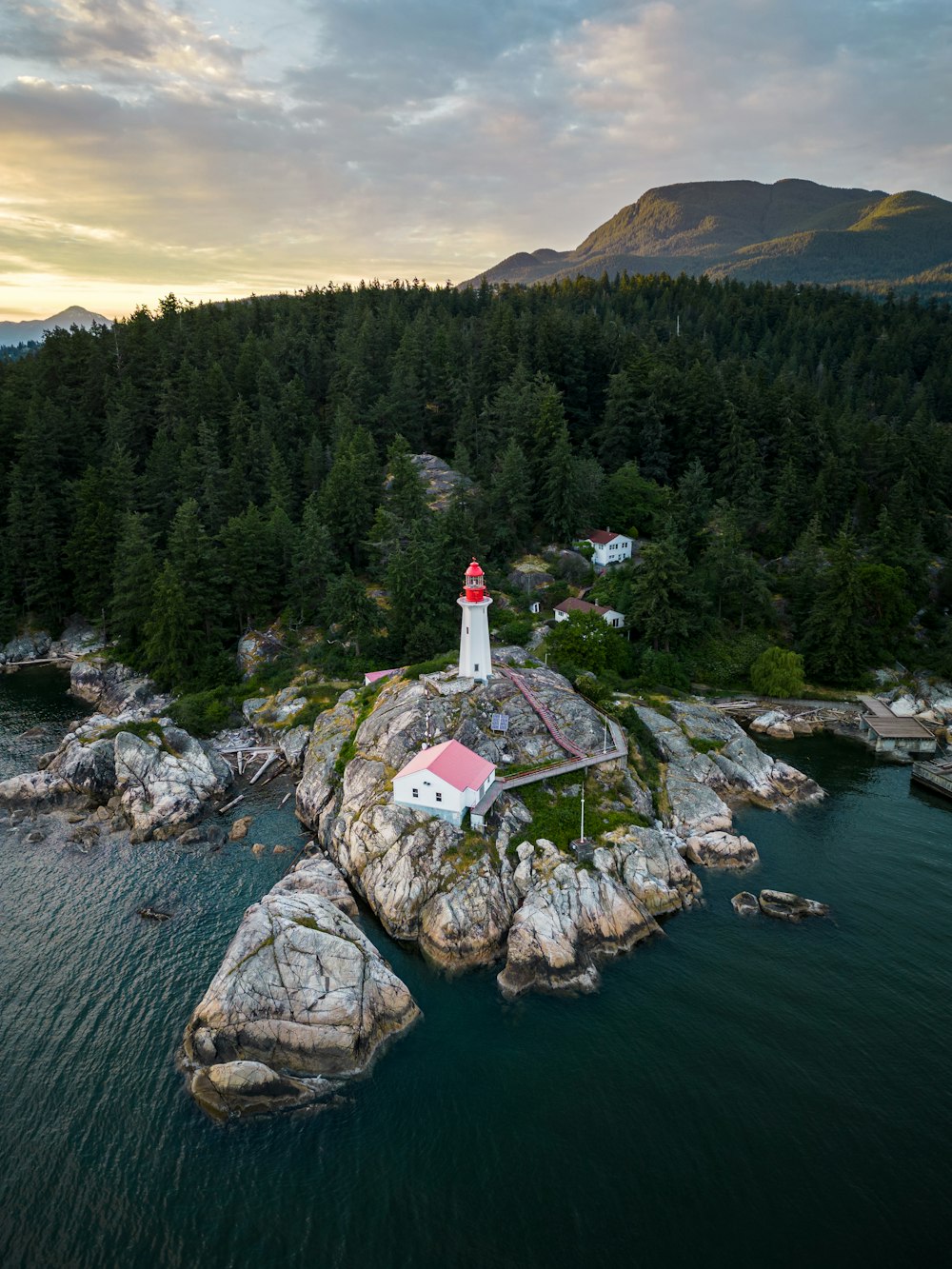 a small house on a rocky cliff