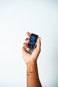 A clean, simple graphic showing a phone icon next to the number 9995498218.