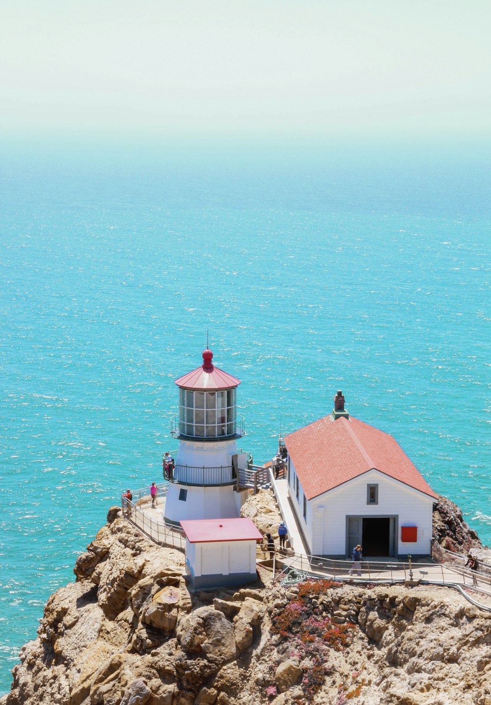 a lighthouse on a rocky shore