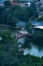 a bridge over a river with buildings on either side of it