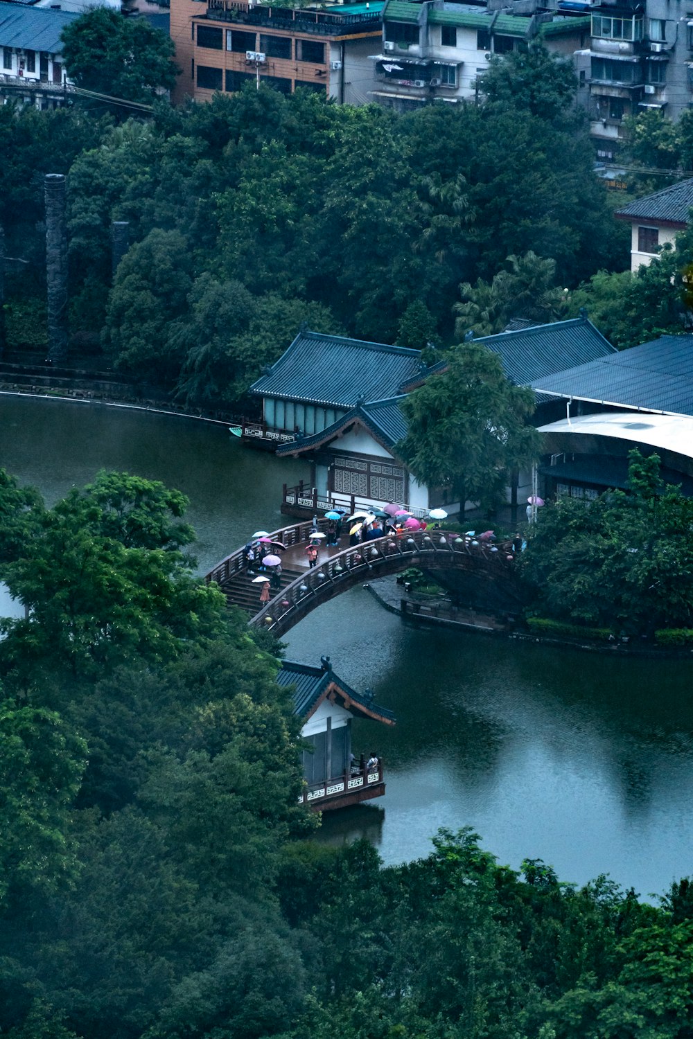 a bridge over a river with buildings on either side of it