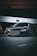 A sleek, black sports car is parked in an urban environment, with a large advertisement billboard in the background. The car's design features sharp, angular lines and a glossy finish, reflecting the ambient light. The overall setting has a slightly moody and dramatic atmosphere.