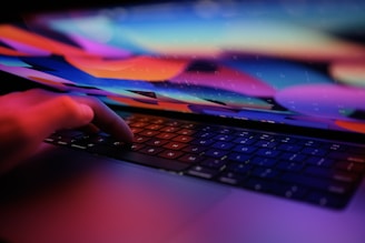 a hand on a keyboard