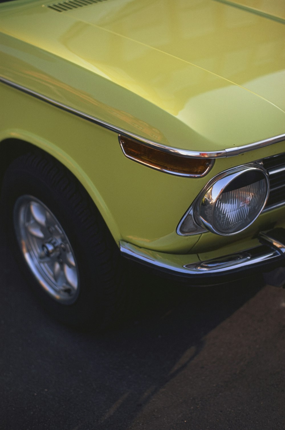 the front of a yellow car