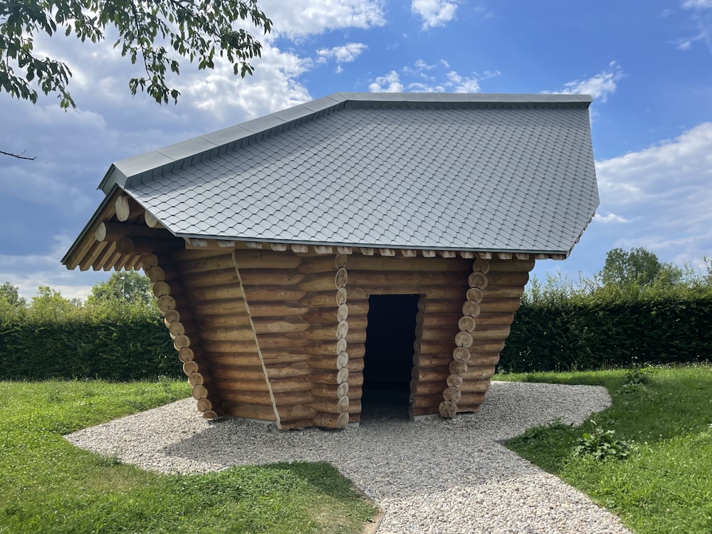 a wood building with a roof