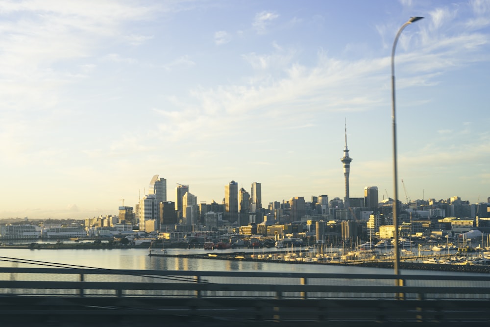 a city skyline with a river