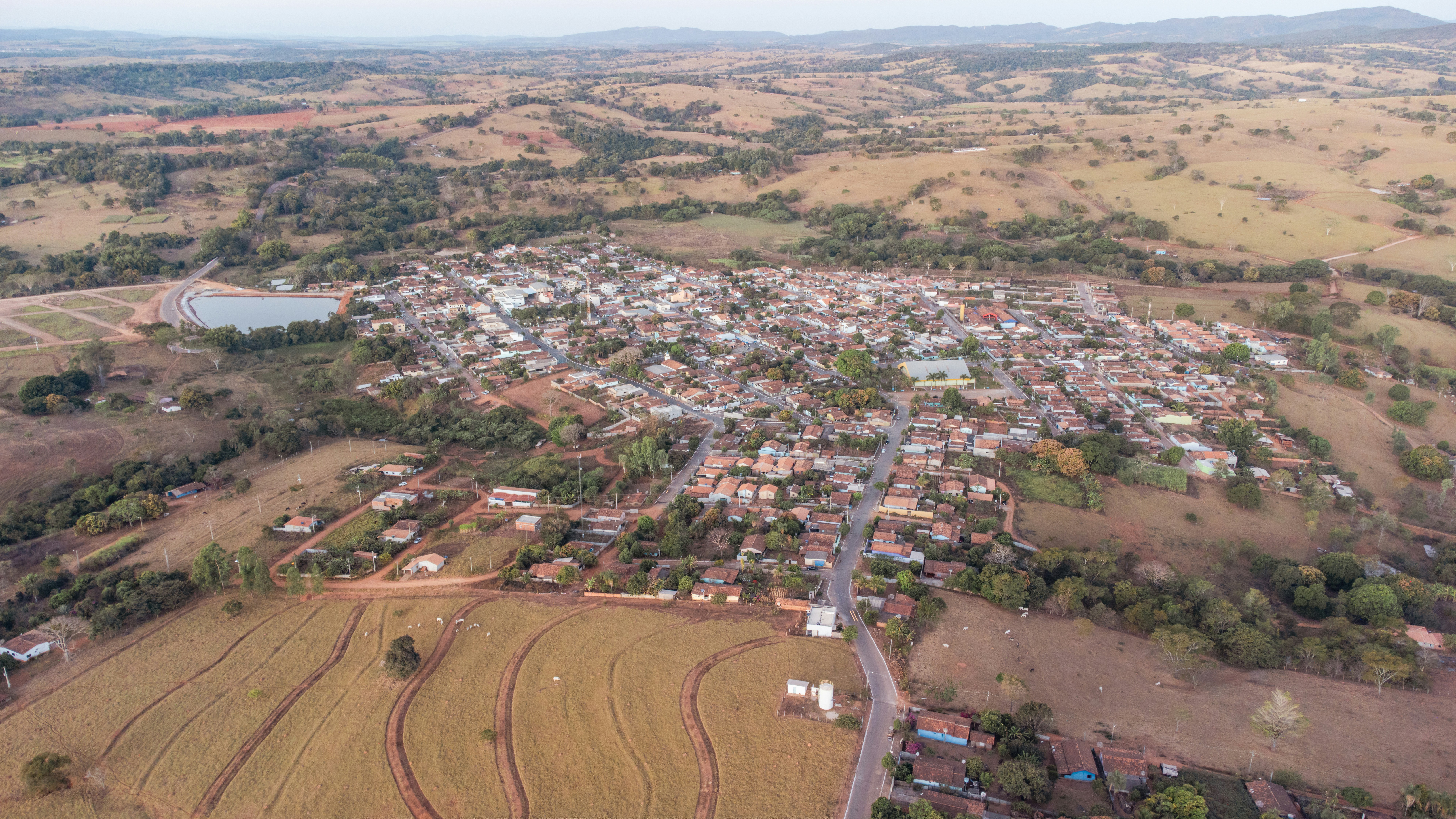 a landscape with trees and buildings
