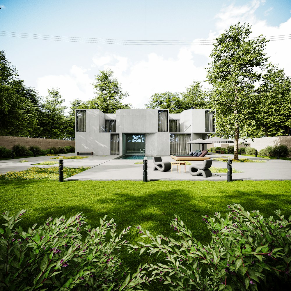 a building with a lawn and trees