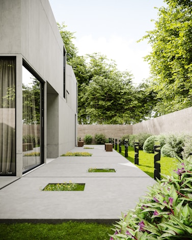 a white house with a small garden