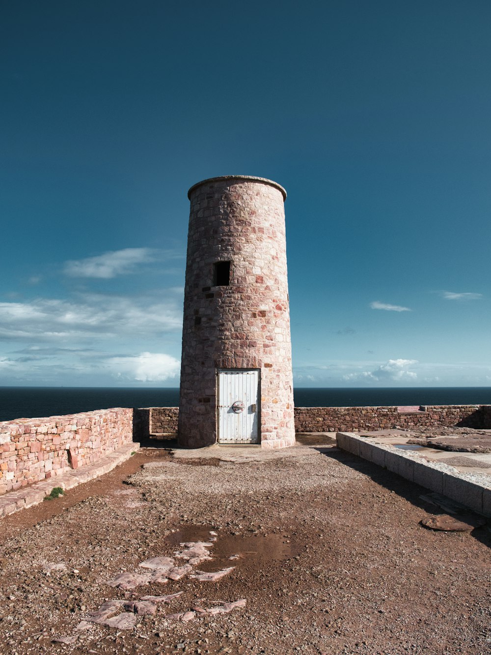 a stone tower with a door