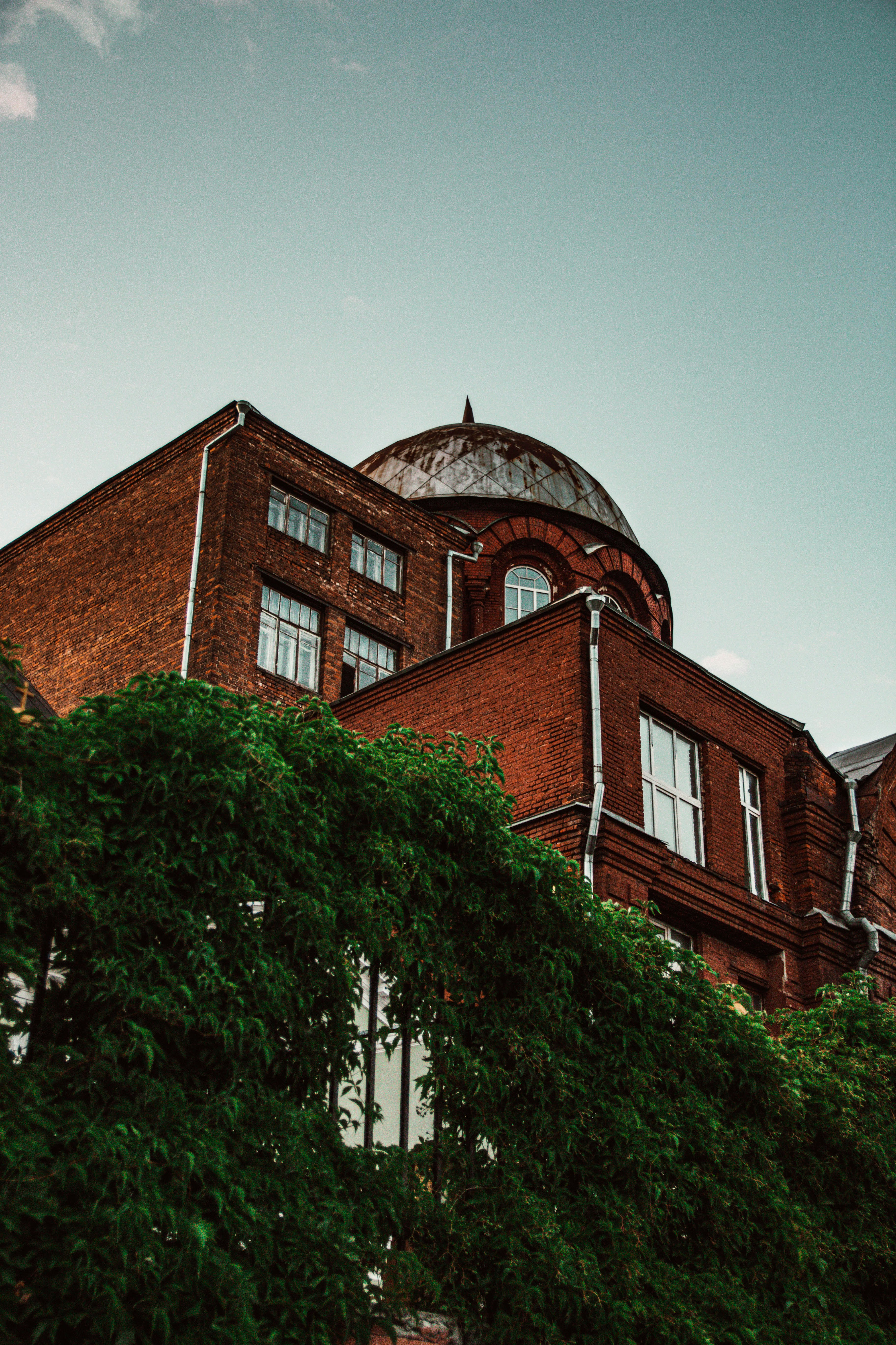 a brick building with a dome