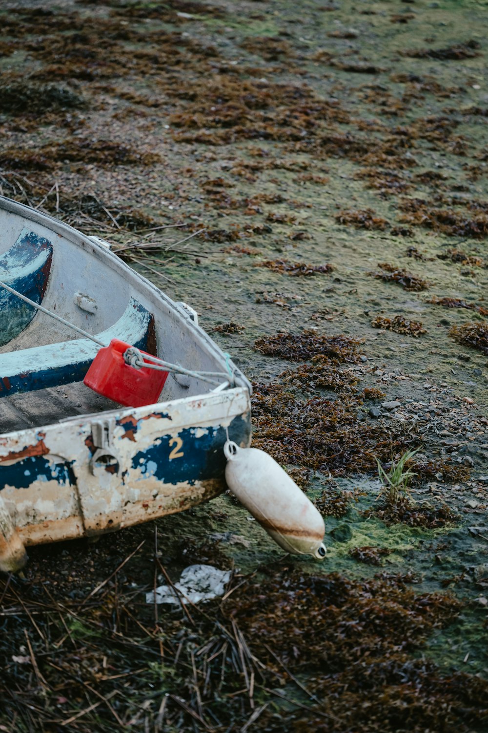 a boat sits on the ground
