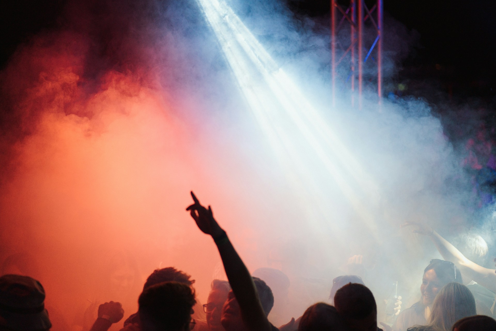 a crowd of people watching a stage