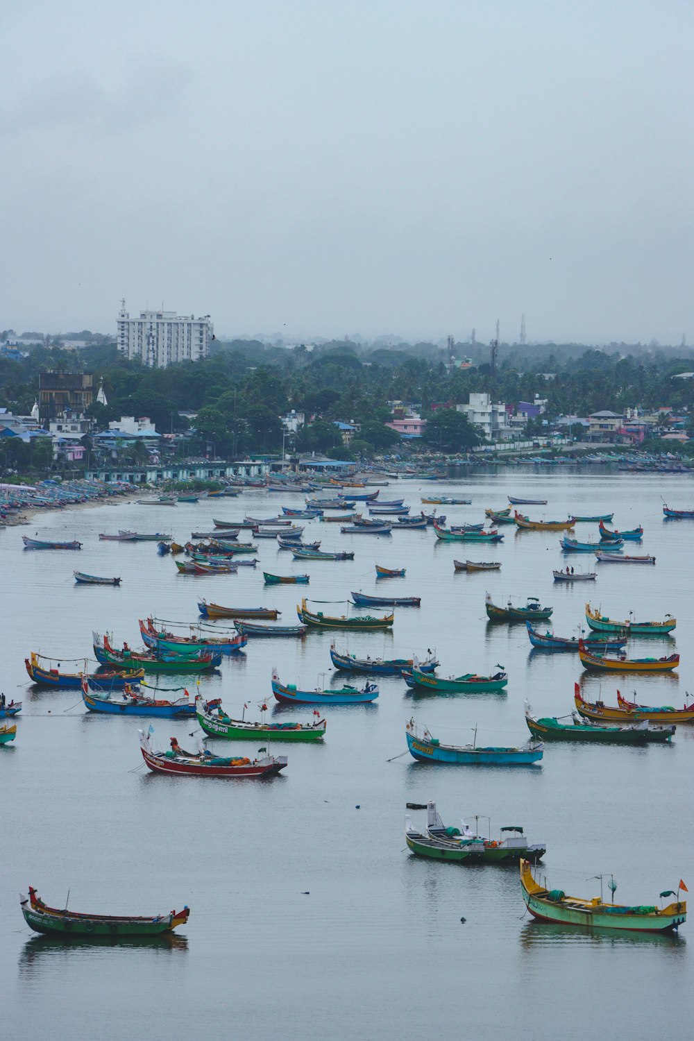 a large group of boats in a harbor