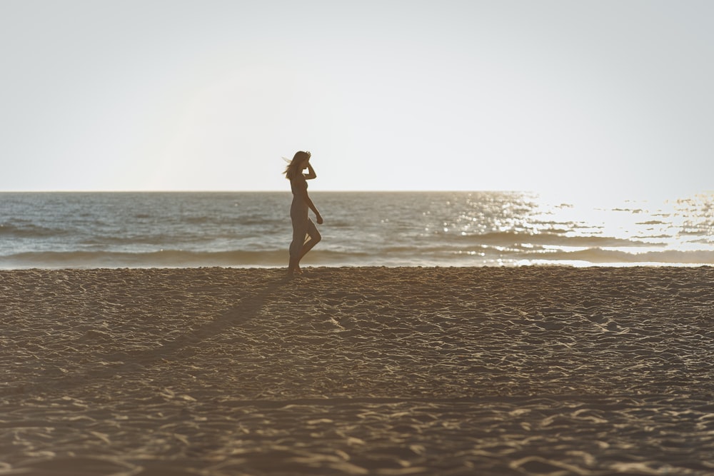 a person running on a beach