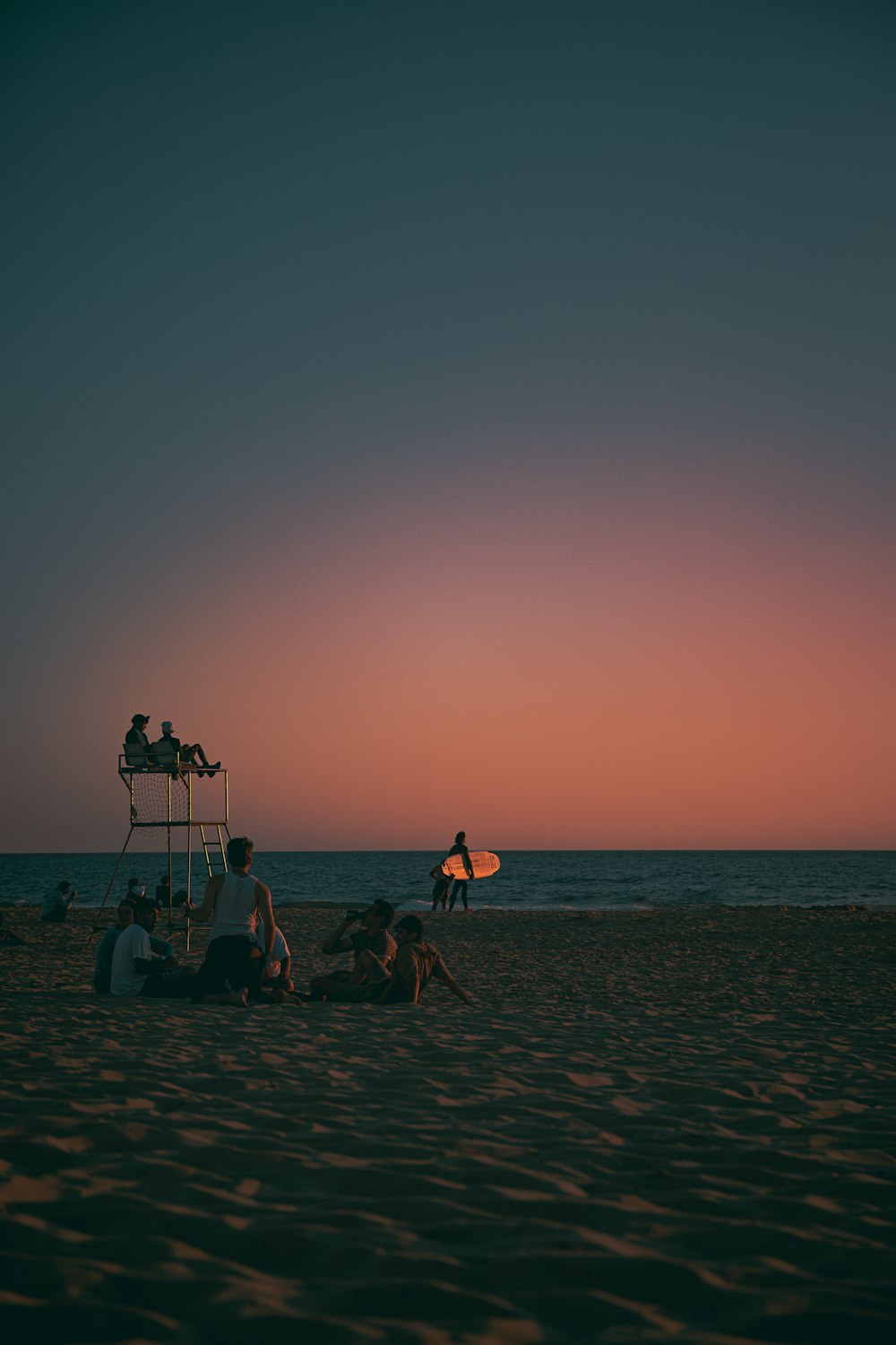 people sitting on a beach