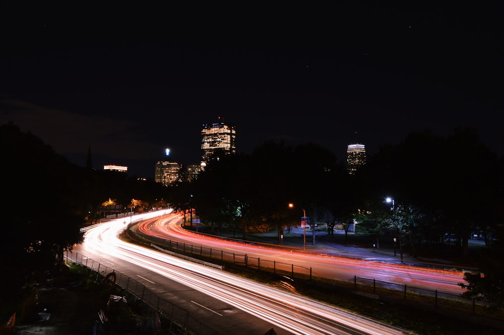 a highway with lights on at night