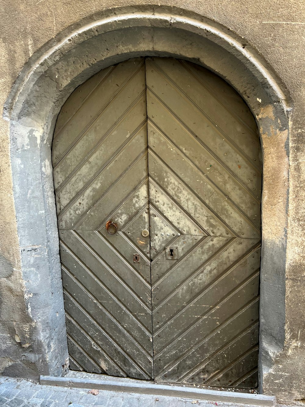 a wooden door with a hole in it