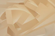 Abstract composition of warm mocha and beige geometric shapes with clean lines.