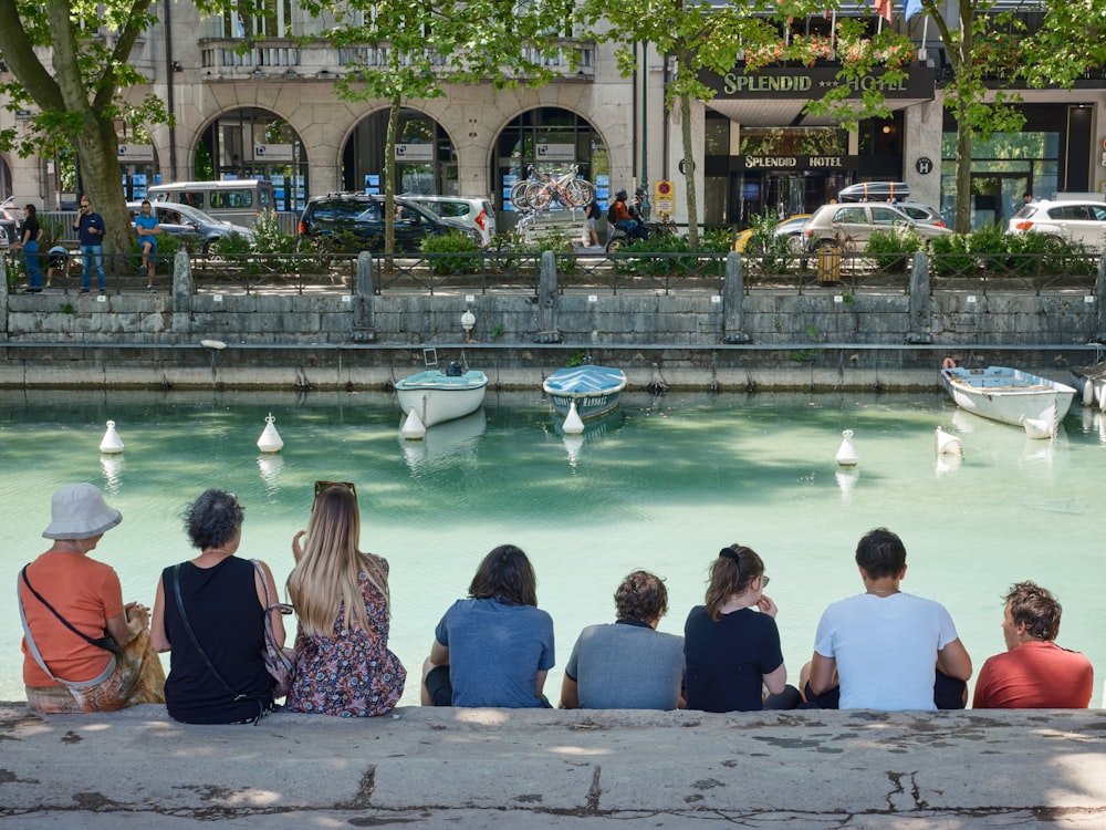 people sitting in a fountain