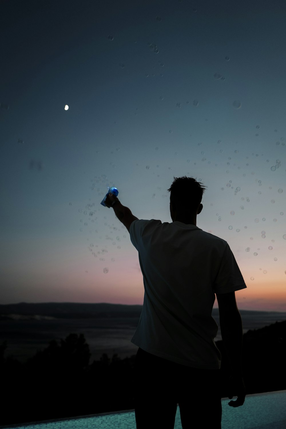 a man holding a bottle