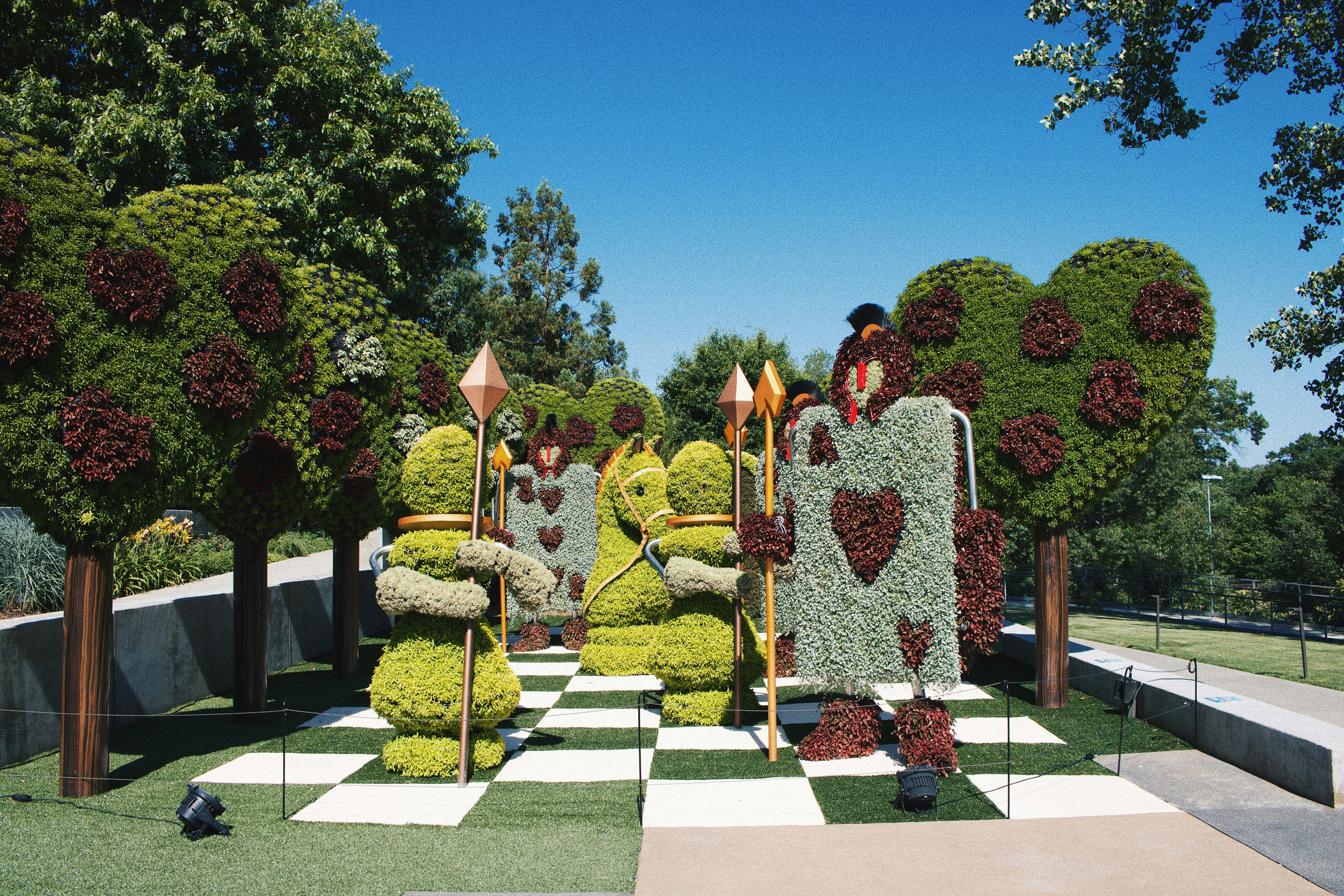 a garden with a statue