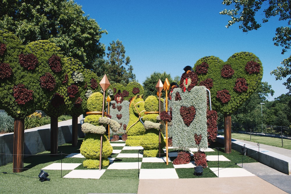 a garden with a statue