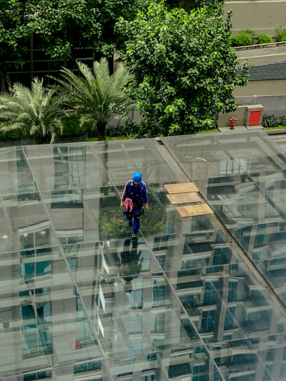 a person walking on a glass floor
