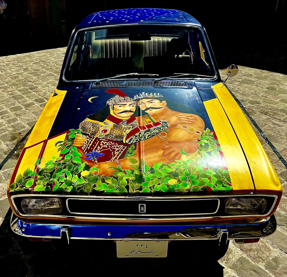 a car with a painting on the hood