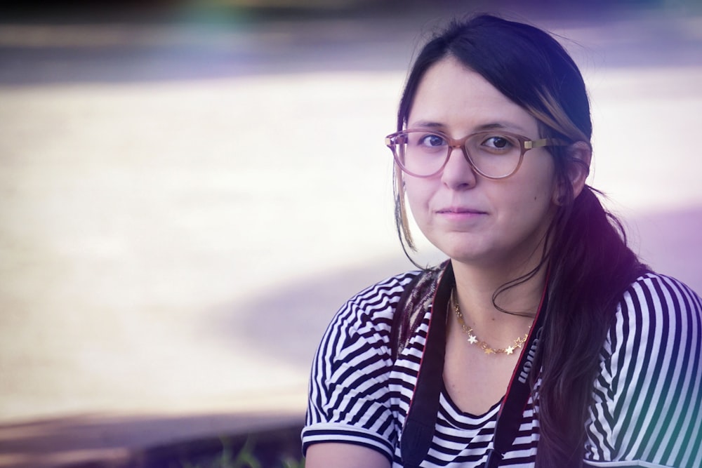 a woman wearing glasses