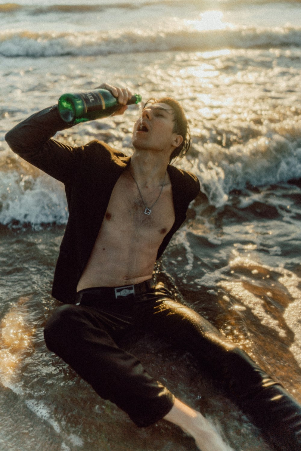 a man sitting on a beach