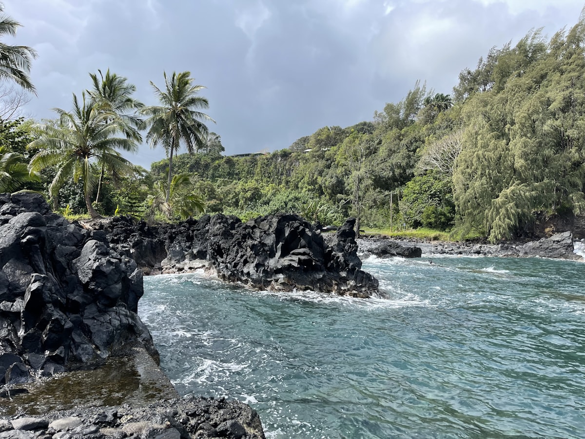 Maui Hawaii — dramatic green sea cliffs and turquoise Pacific waters of the Valley Isle from above