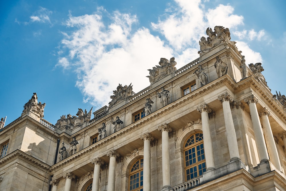 a building with columns and statues