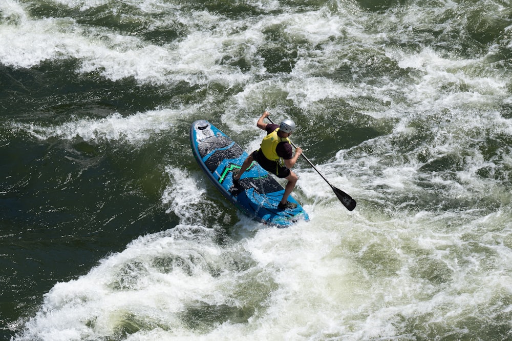 a man riding a surfboard