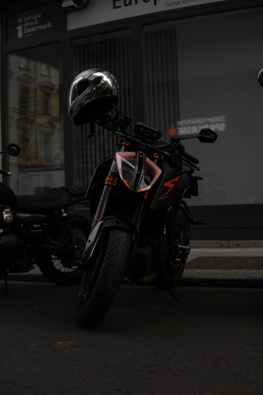 a motorcycle parked on the side of a street