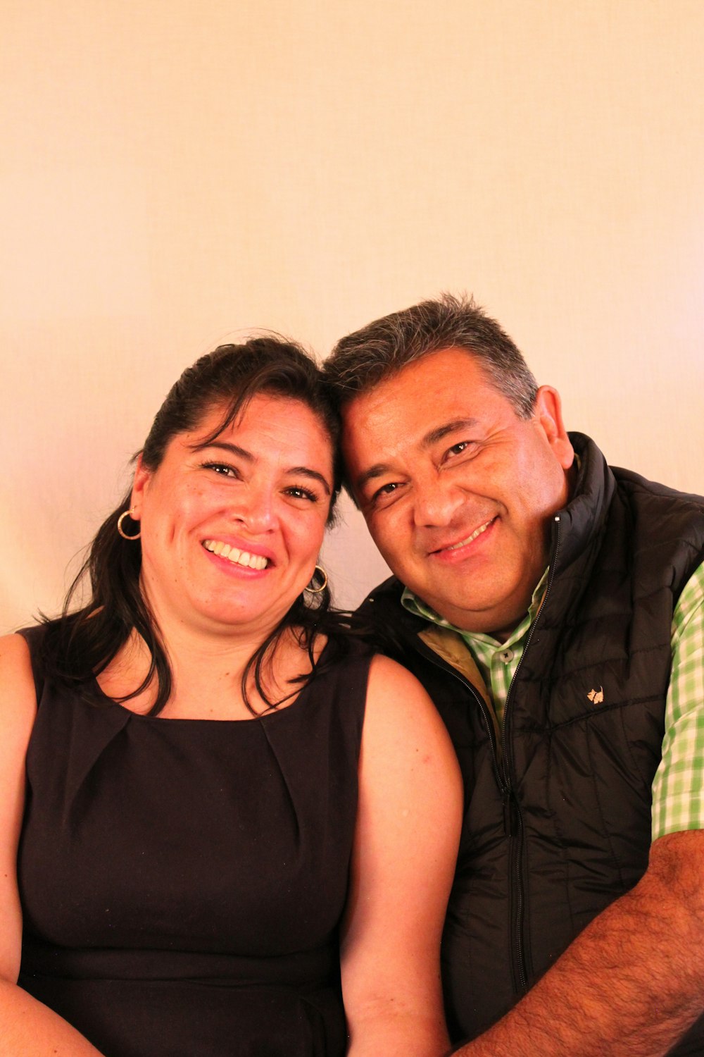 a man and woman smiling