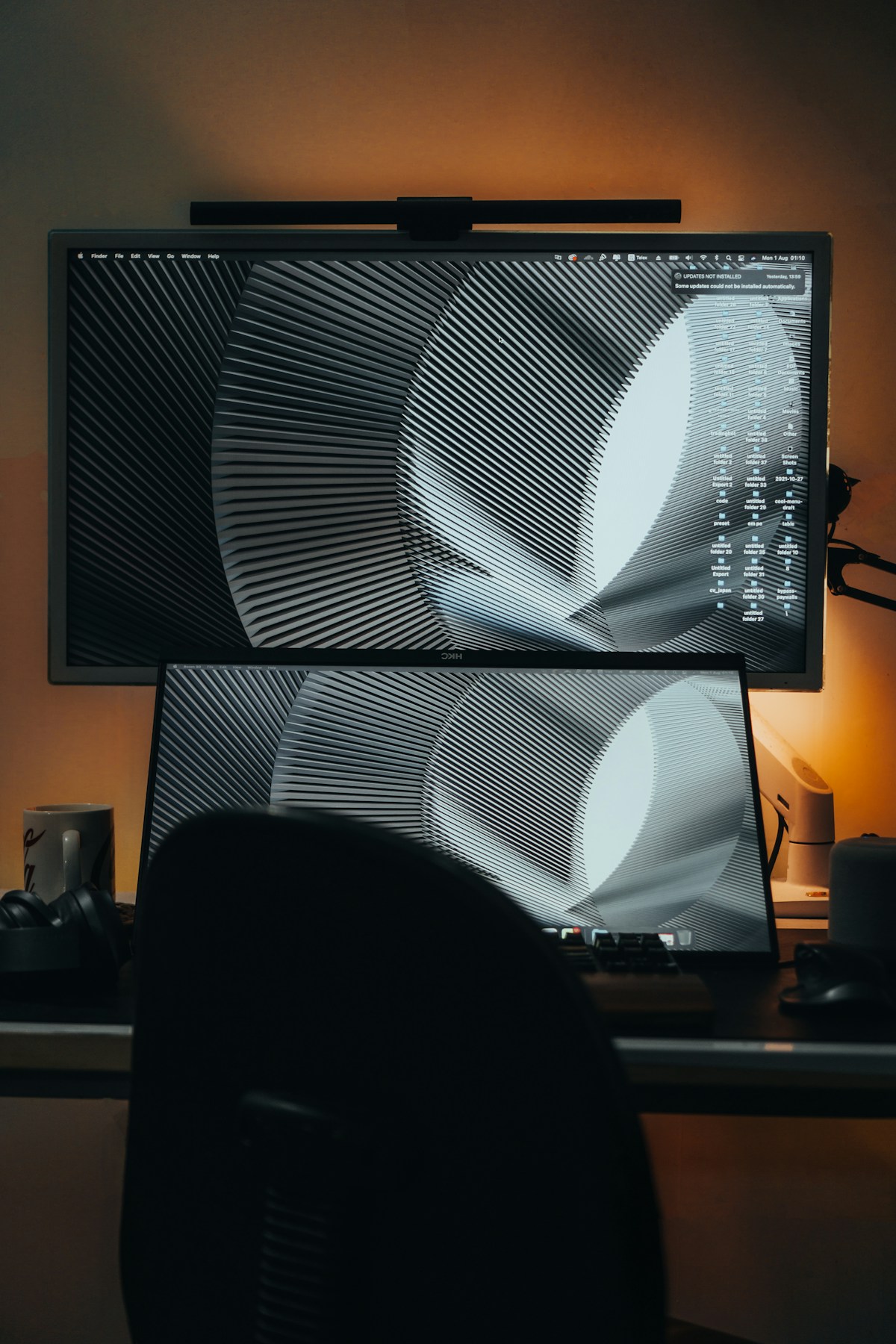 A person's legs and a tv screen