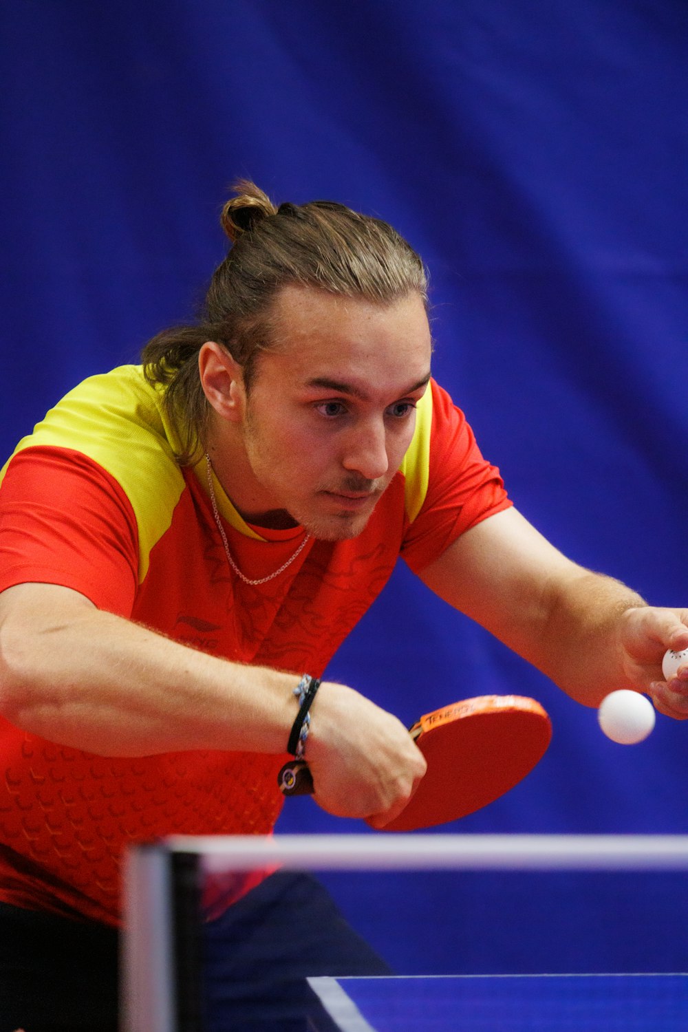 a person playing table tennis