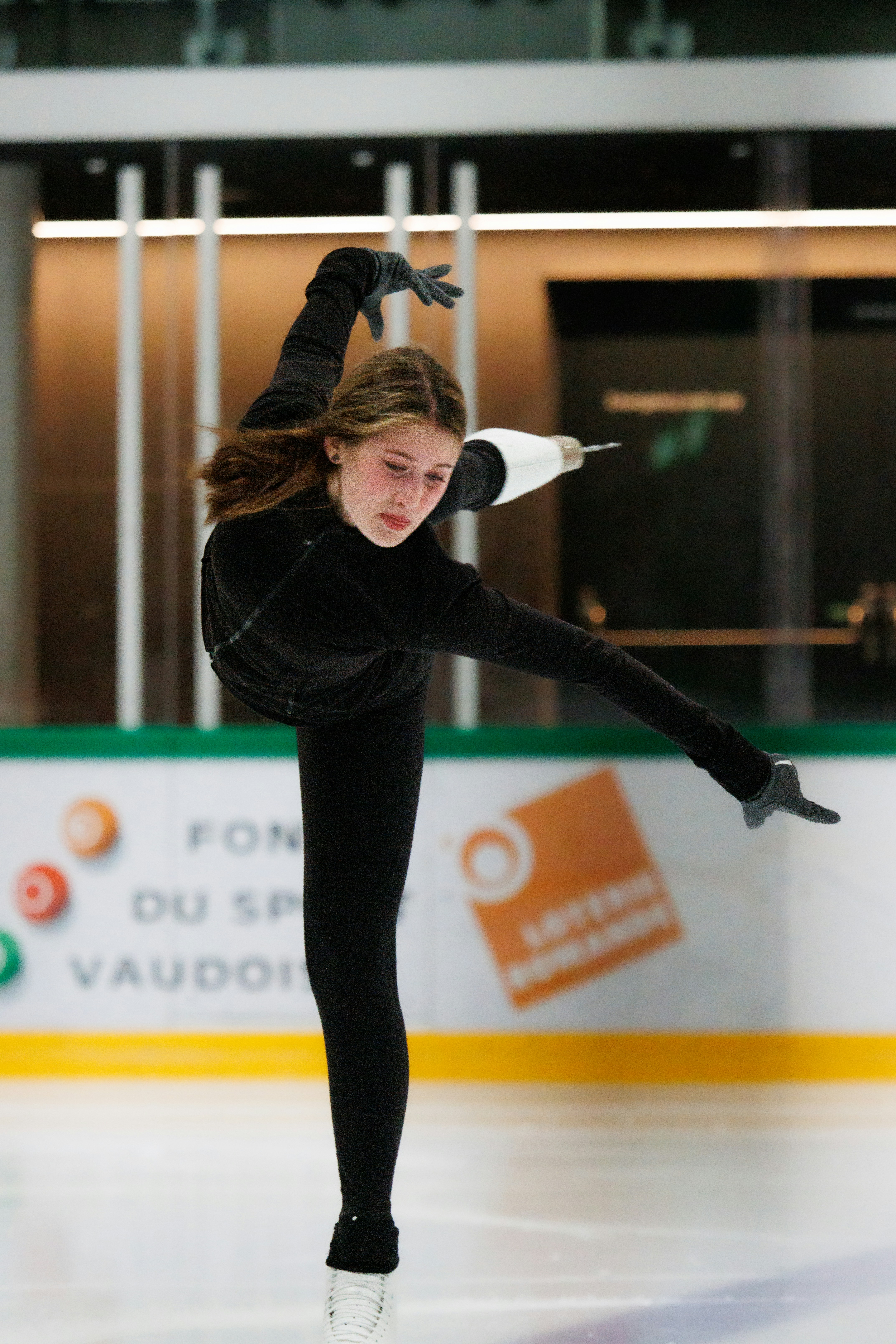 femal figure skater doing a spiral