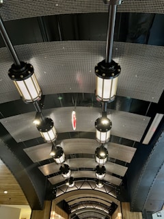 A modern industrial lighting system illuminating a workspace.