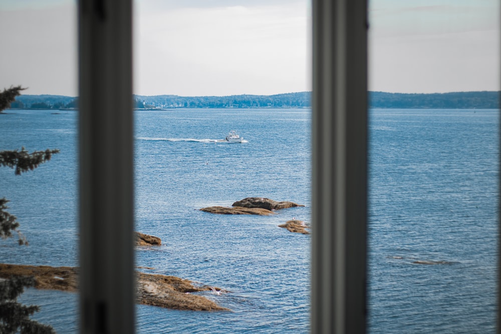 a view of the ocean from a window