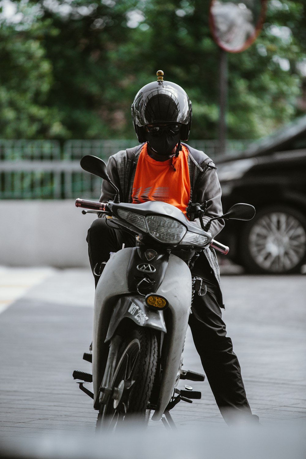 a man riding a motorcycle