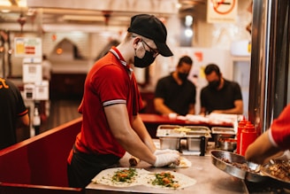 a chef preparing food in a restaurant