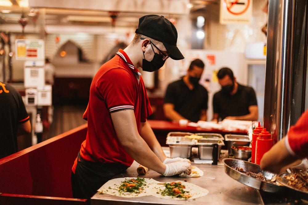 a chef preparing food in a restaurant