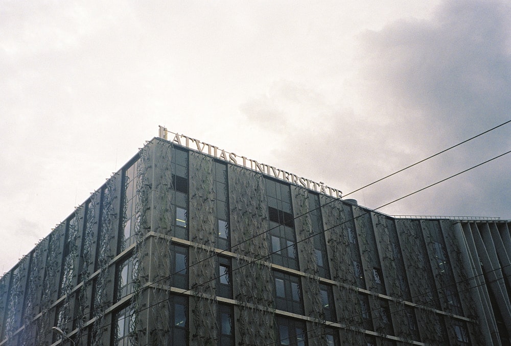 a building with a wire fence