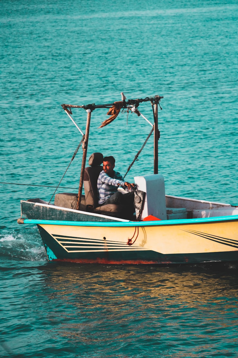 a couple of people on a boat