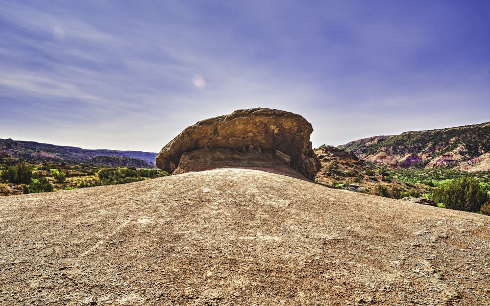 a large rock formation in a desert